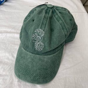 Green hat! Monstera leaves on front. “Plant mom” on back. Never worn with tag.